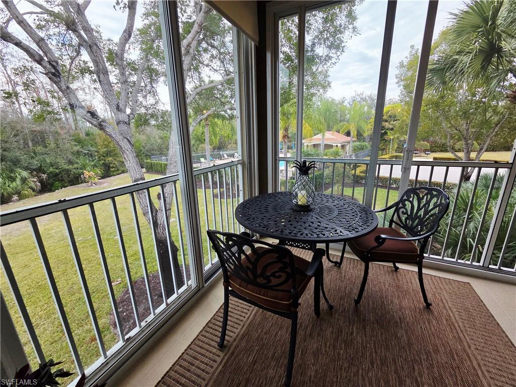 6775 Huntington Lakes Circle, Unit 202 Naples, FL 34119 - Photo 17 of 46 a view of a chairs on the roof deck