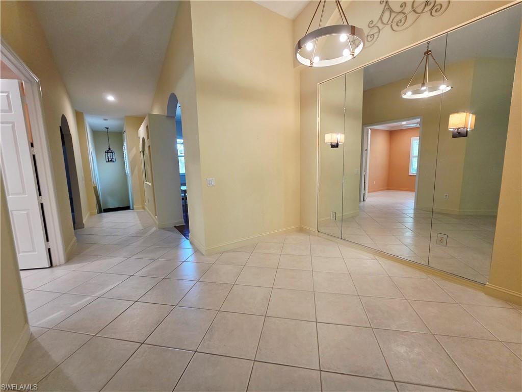 6775 Huntington Lakes Circle, Unit 202 Naples, FL 34119 - Photo 33 of 46 a view of a hallway