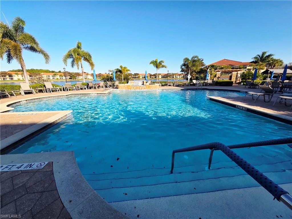 6775 Huntington Lakes Circle, Unit 202 Naples, FL 34119 - Photo 36 of 46 a view of a lake with couches