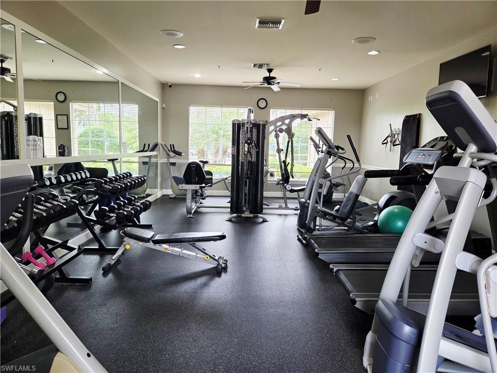6775 Huntington Lakes Circle, Unit 202 Naples, FL 34119 - Photo 38 of 46 a view of a room with gym equipment