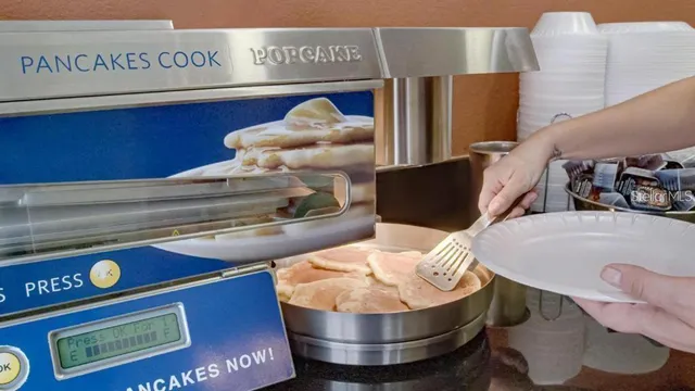 an aerial view of a house with yard swimming pool and outdoor seating