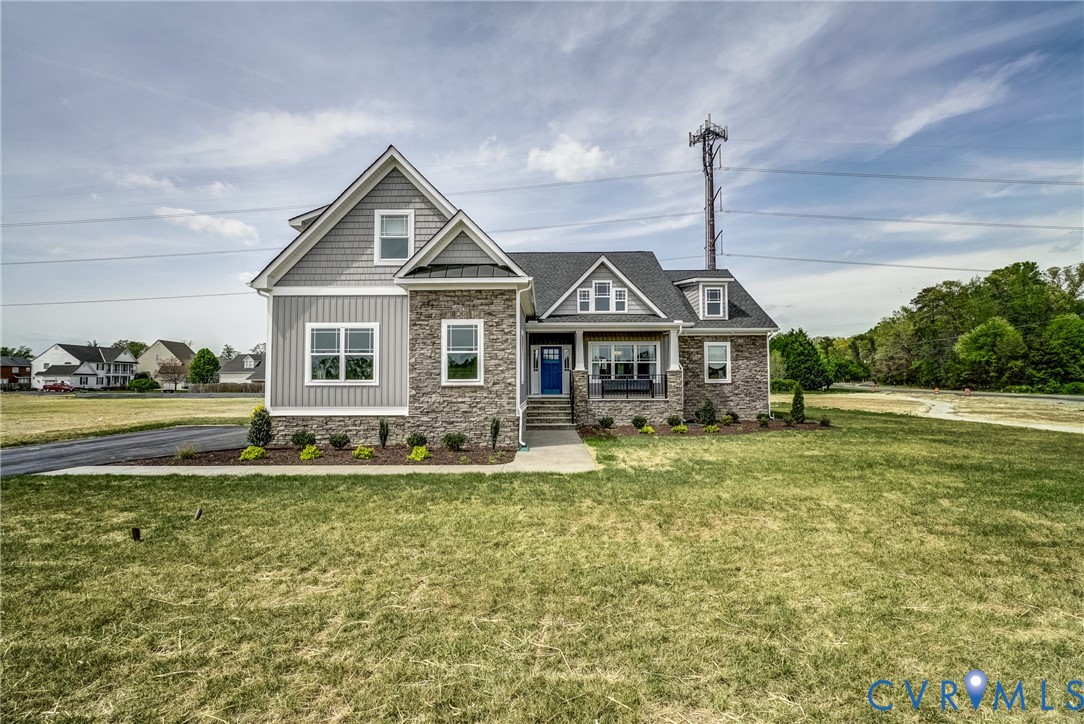 Lot 4 Wendenburg Terrace Aylett, VA 23009 - Photo 2 of 32 a front view of a house with a yard