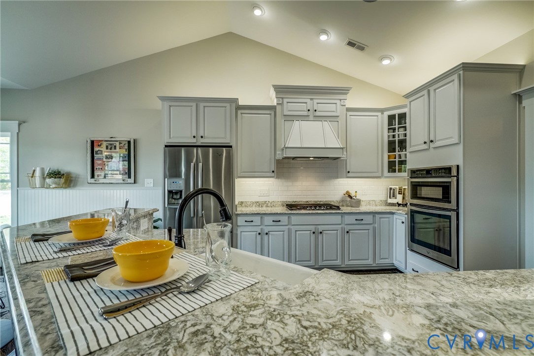 Lot 4 Wendenburg Terrace Aylett, VA 23009 - Photo 24 of 32 a kitchen with granite countertop a sink stainless steel appliances and cabinets