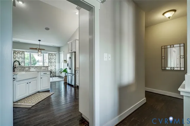 a view of a porch with furniture and a fireplace