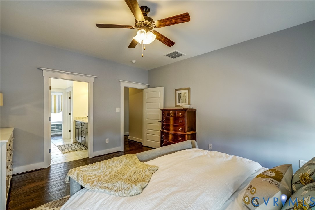 Lot 4 Wendenburg Terrace Aylett, VA 23009 - Photo 29 of 32 a bedroom with a bed and a chandelier