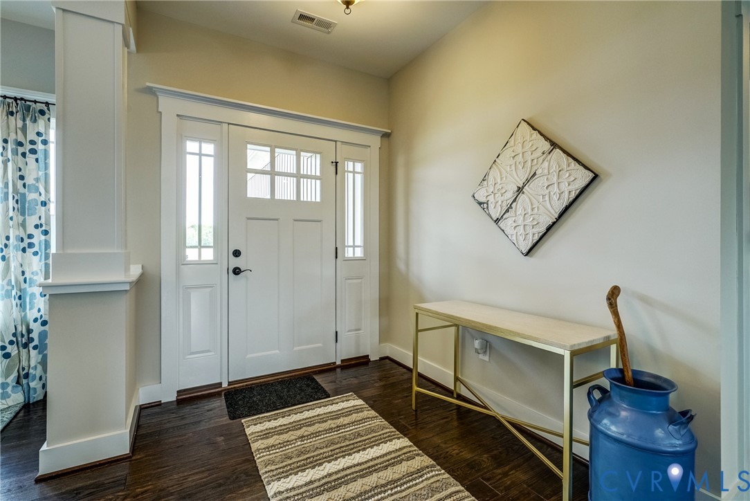 Lot 4 Wendenburg Terrace Aylett, VA 23009 - Photo 6 of 32 a view of a hallway with wooden floor and a bathroom