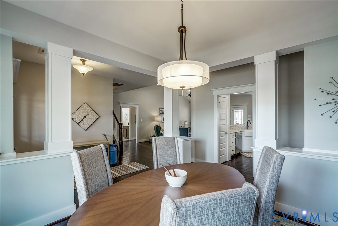 Lot 4 Wendenburg Terrace Aylett, VA 23009 - Photo 9 of 32 a dining room with furniture a chandelier and wooden floor