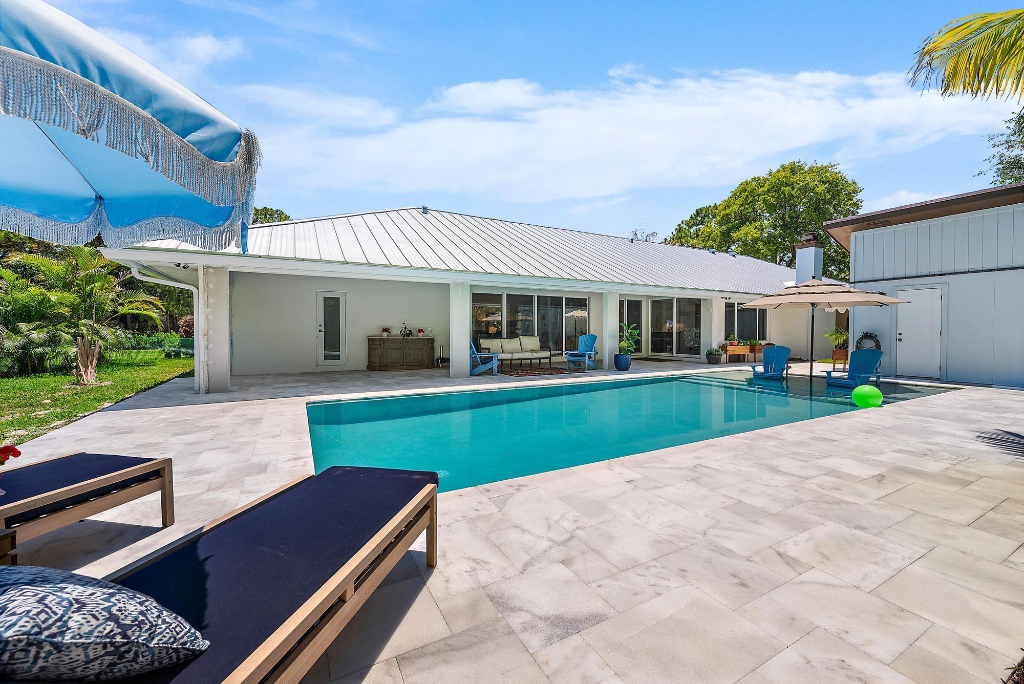 6799 Imperial Woods Road Jupiter, FL 33458 - Photo 36 of 51 Pool & Back Exterior