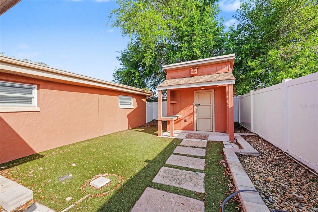 8828 Carmen Lane Port Richey, FL 34668 - Photo 24 of 28 a view of a back yard of the house
