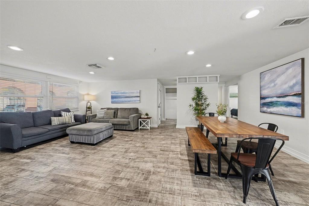 8828 Carmen Lane Port Richey, FL 34668 - Photo 7 of 28 a living room with furniture and wooden floor