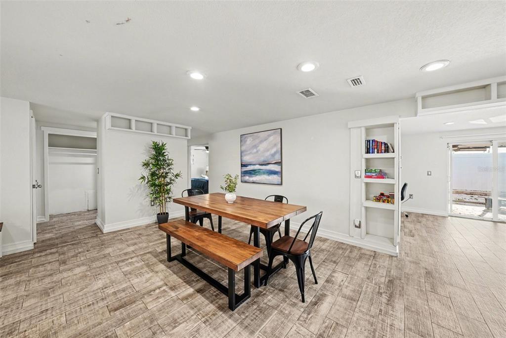 8828 Carmen Lane Port Richey, FL 34668 - Photo 8 of 28 a living room with furniture and wooden floor