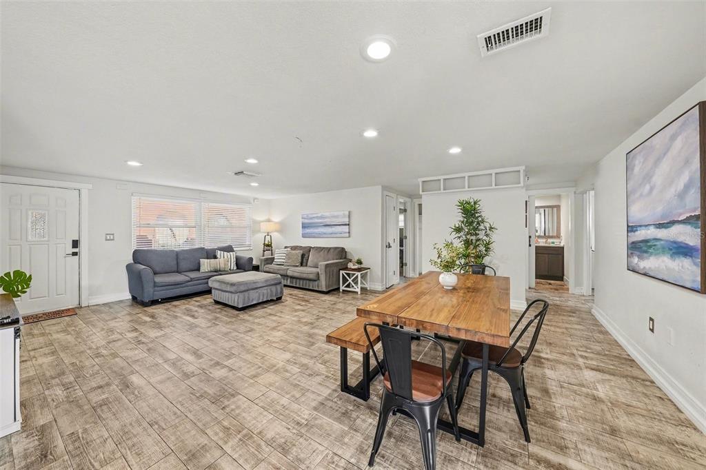 8828 Carmen Lane Port Richey, FL 34668 - Photo 10 of 28 a living room with furniture and a table