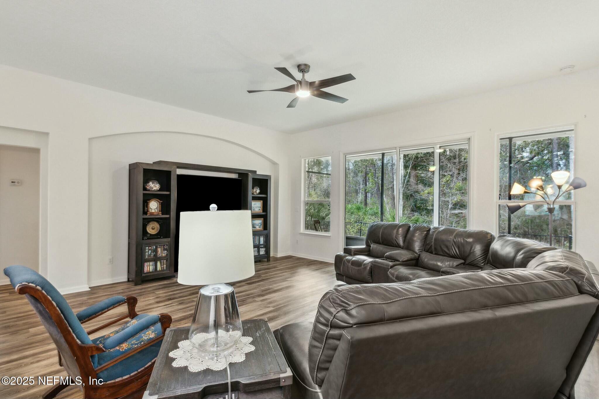 86197 Fortune Drive Yulee, FL 32097 - Photo 13 of 36 a living room with furniture and a large window