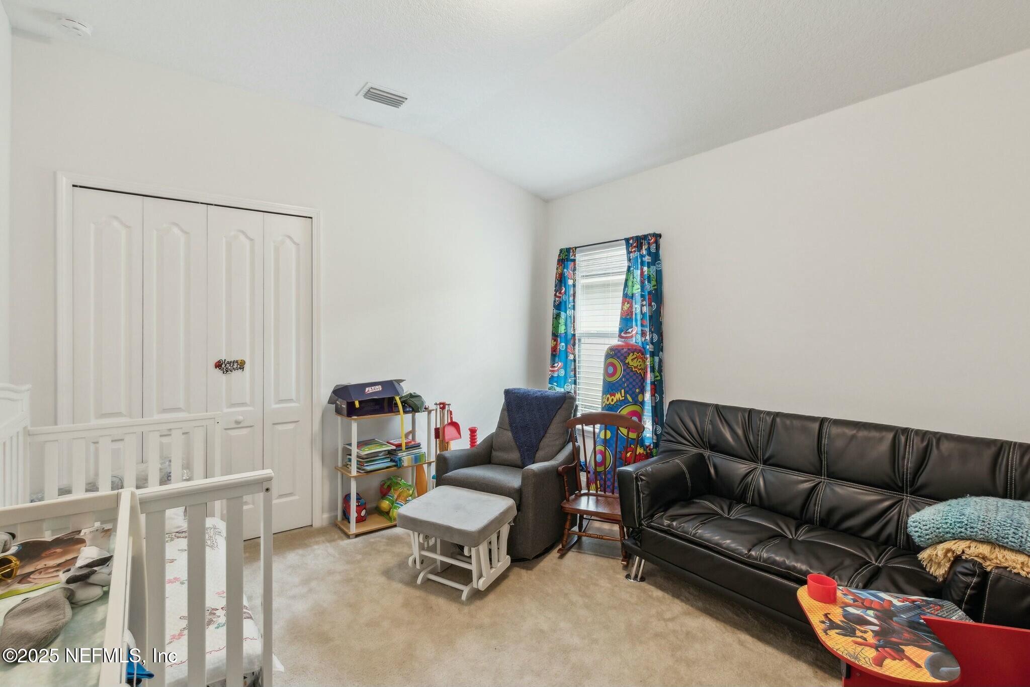 86197 Fortune Drive Yulee, FL 32097 - Photo 22 of 36 a living room with furniture