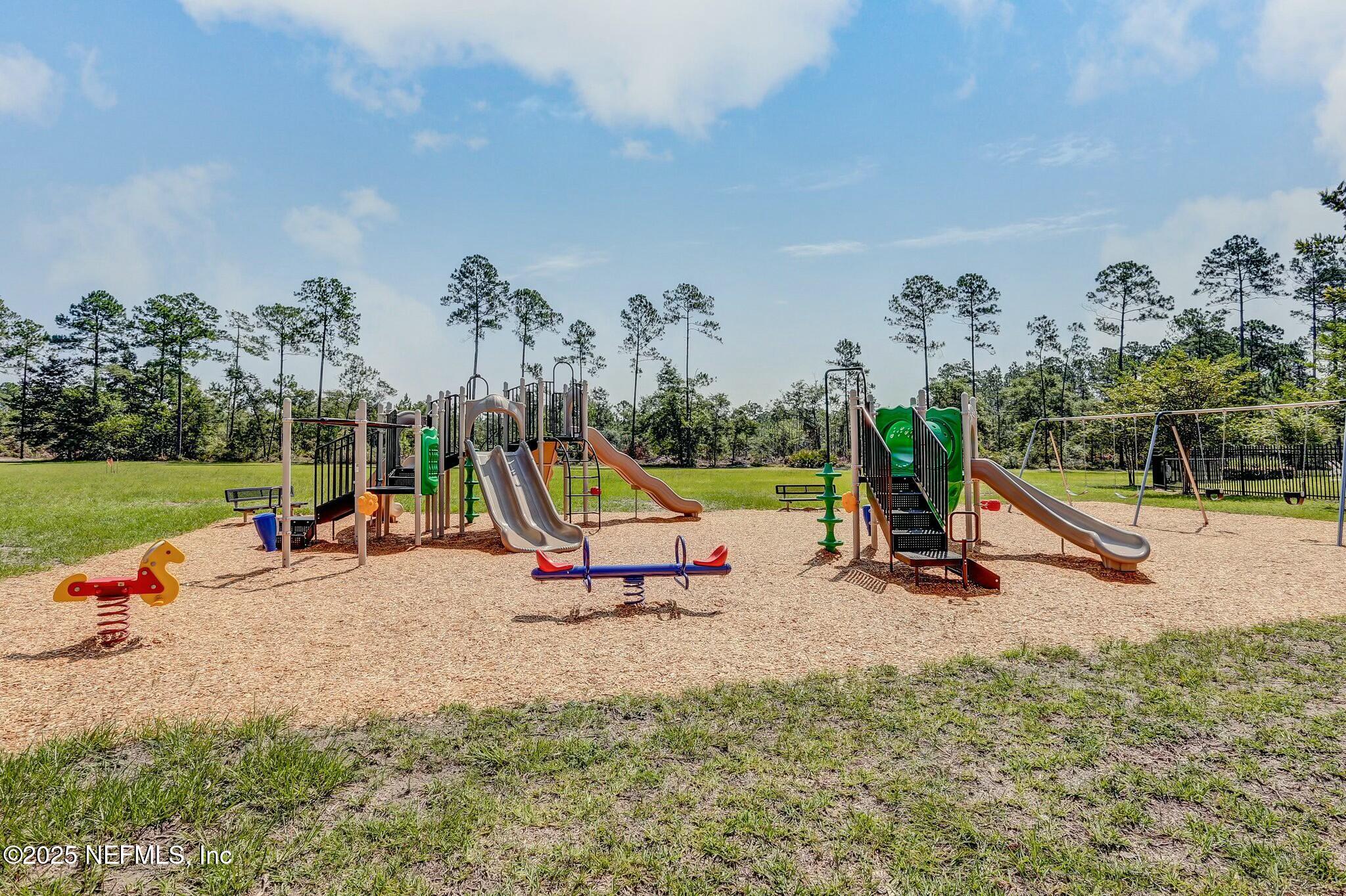 86197 Fortune Drive Yulee, FL 32097 - Photo 34 of 36 a view of a park with slide