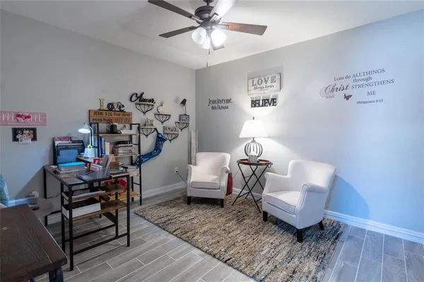 a spacious bathroom with a double vanity sink and mirror