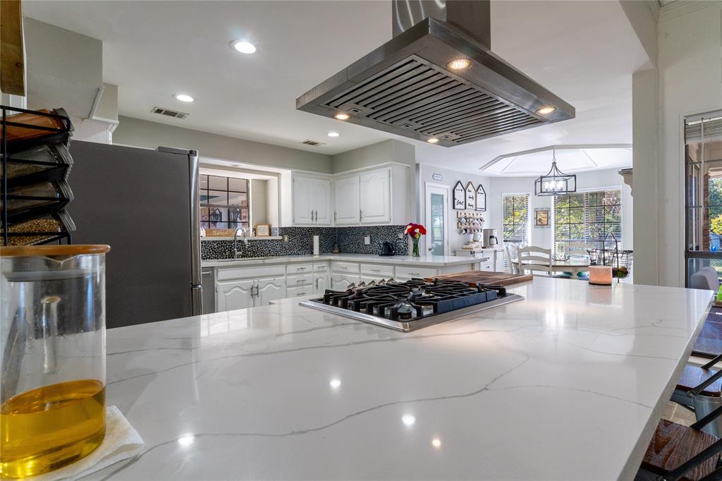 1246 Meadow Way Terrell, TX 75160 - Photo 27 of 39 a kitchen with counter top space cabinets and appliances