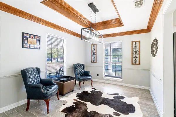 a kitchen with a refrigerator a stove a sink and dishwasher with wooden floor