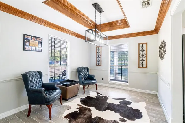 a kitchen with a refrigerator a stove a sink and dishwasher with wooden floor