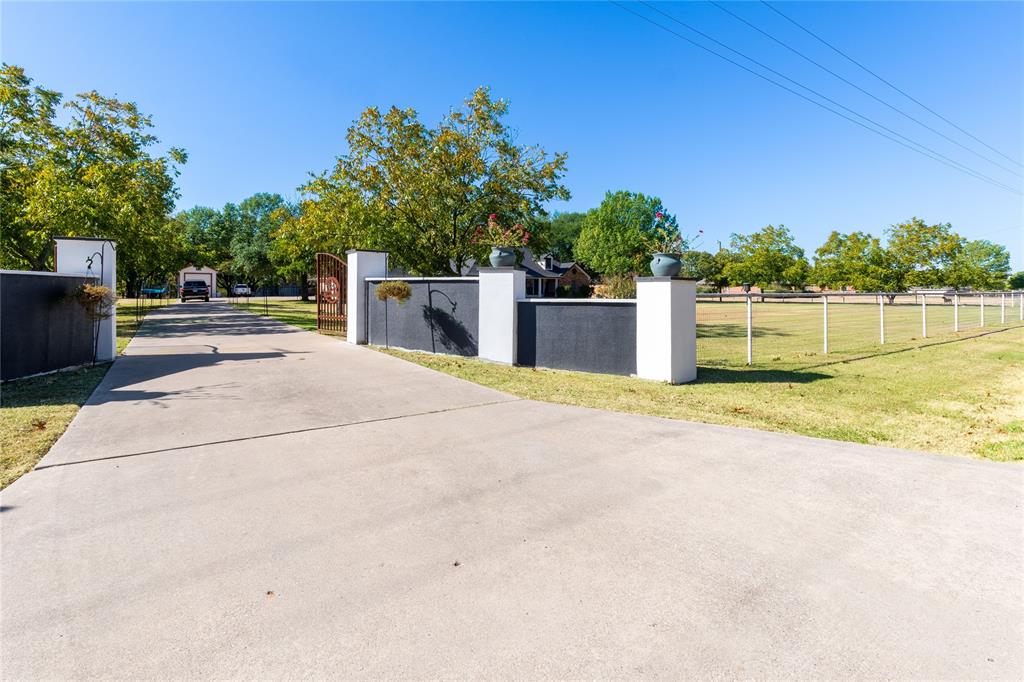 1246 Meadow Way Terrell, TX 75160 - Photo 3 of 39 a view of a swimming pool with an outdoor seating