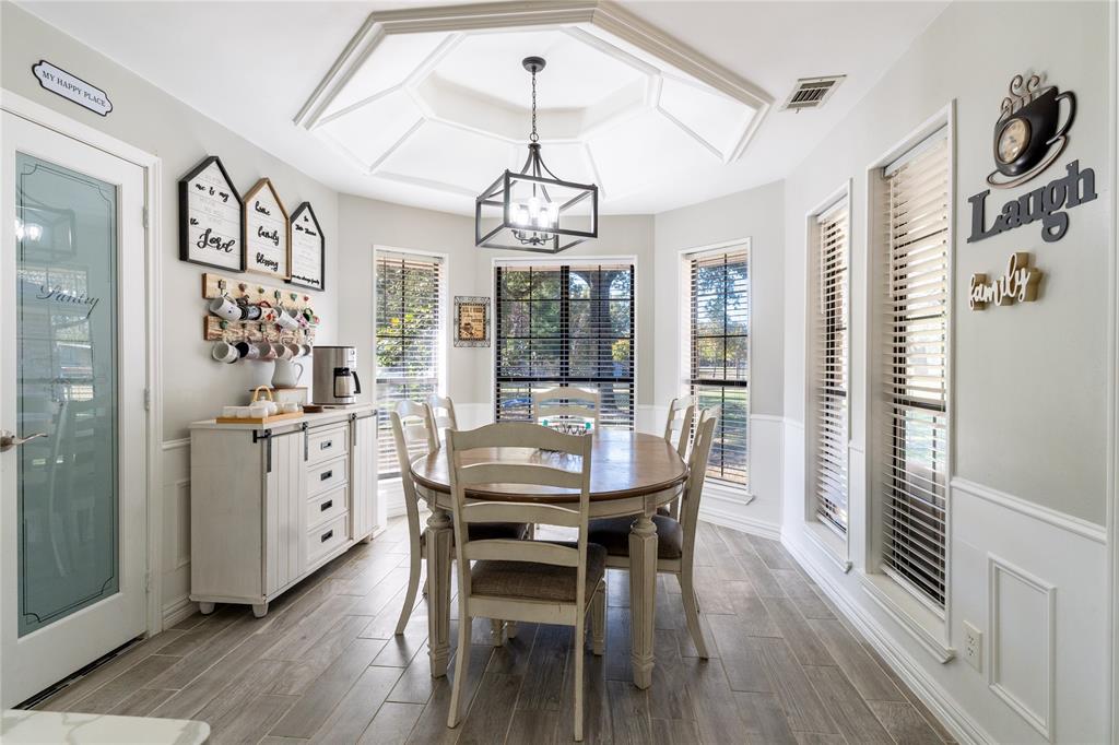 1246 Meadow Way Terrell, TX 75160 - Photo 31 of 39 a view of a dining room with furniture window and wooden floor