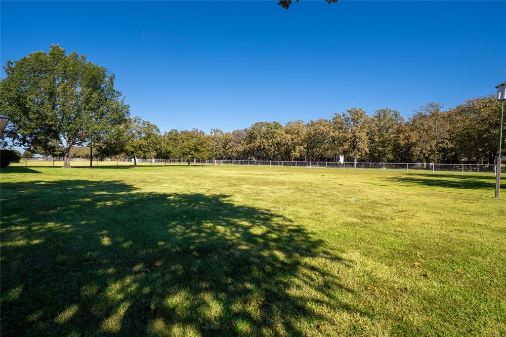 1246 Meadow Way Terrell, TX 75160 - Photo 5 of 39 a view of a lake with a yard