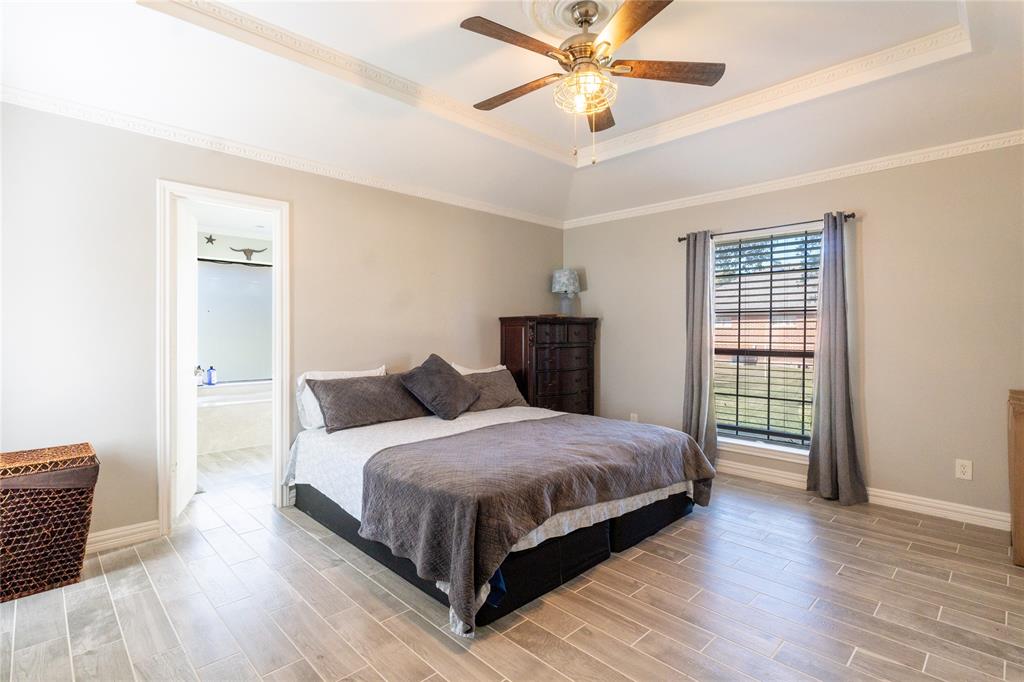 1246 Meadow Way Terrell, TX 75160 - Photo 10 of 39 a bedroom with a bed and a window