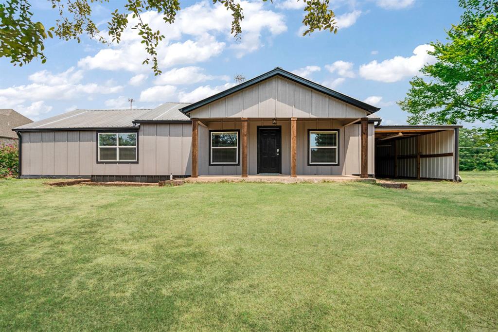 6545 Pine Mill Road Reno, TX 75462 - Photo 1 of 1 View of front of home with covered porch and a front yard