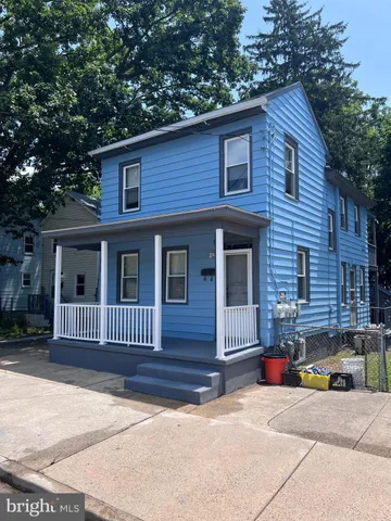 a front view of a house with a garage