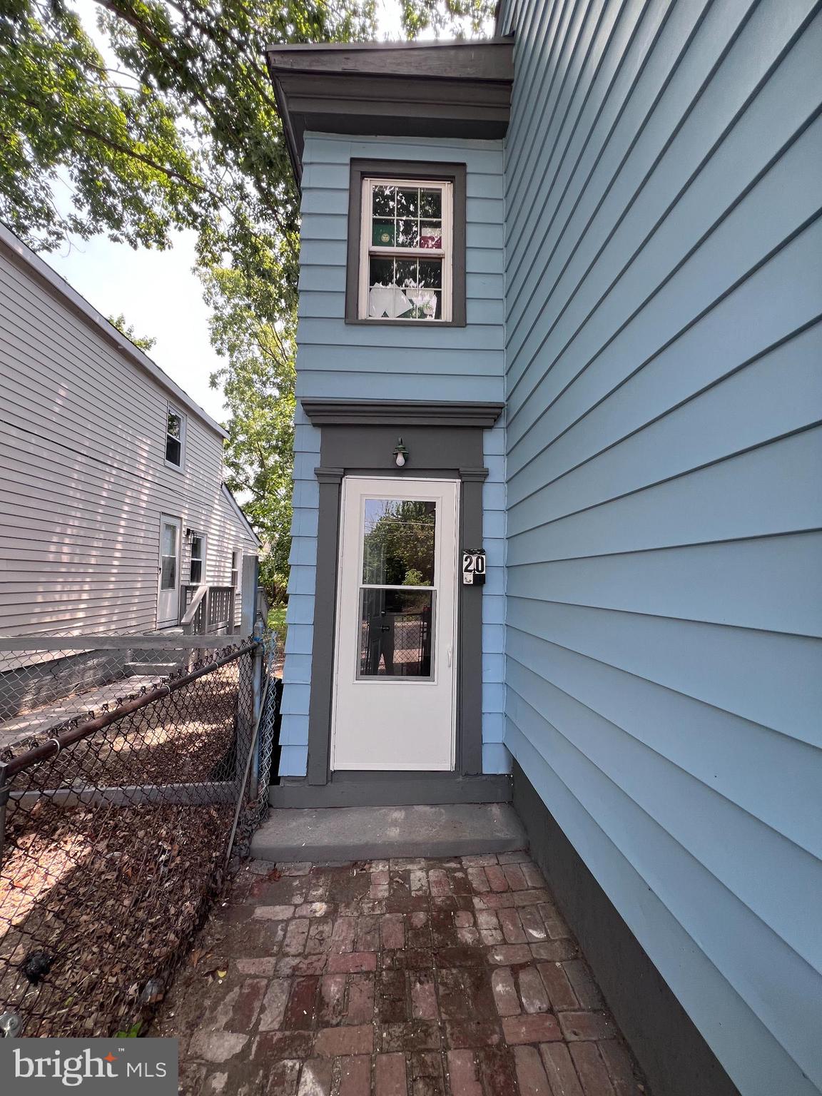 20 Olive Street, Unit C Salem, NJ 08079 - Photo 5 of 11 a front view of a house with a yard