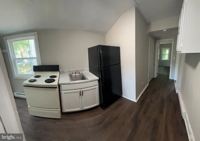 a utility room with washer and dryer