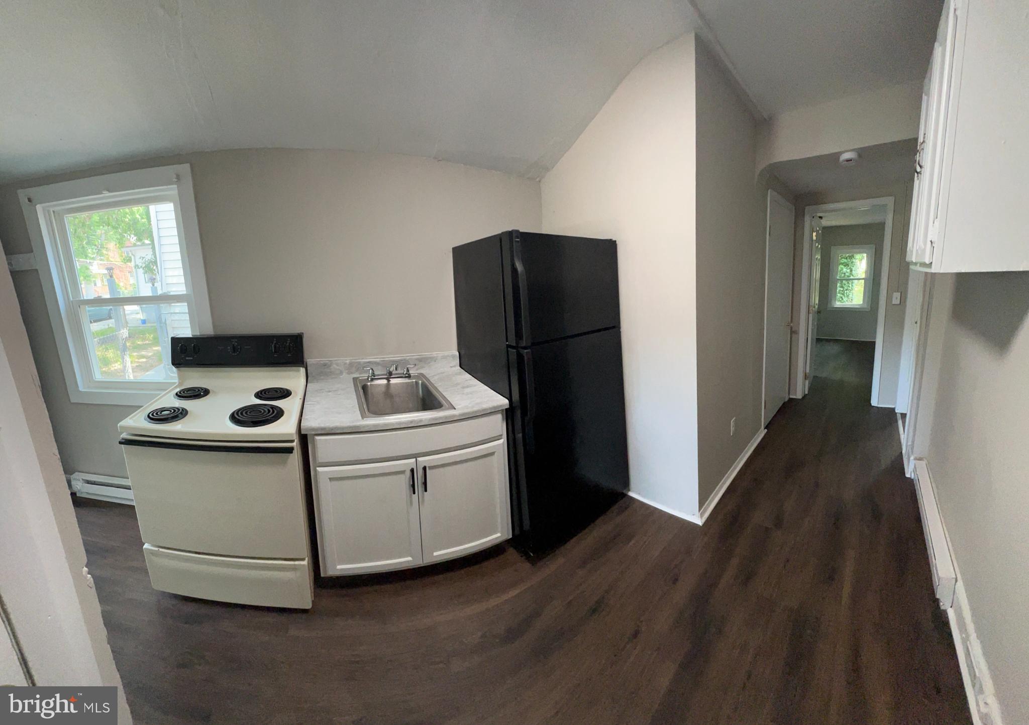 20 Olive Street, Unit C Salem, NJ 08079 - Photo 7 of 11 a utility room with washer and dryer