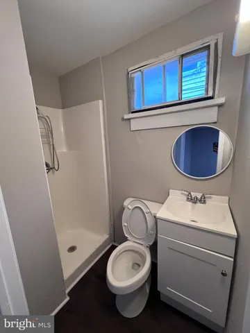 a bathroom with a toilet and a sink