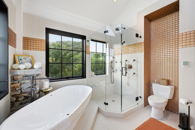 5971 Maple Ridge Trail Oakley, UT 84055 - Photo 29 of 43 Freestanding soaking tub complemented by a stone-clad feature