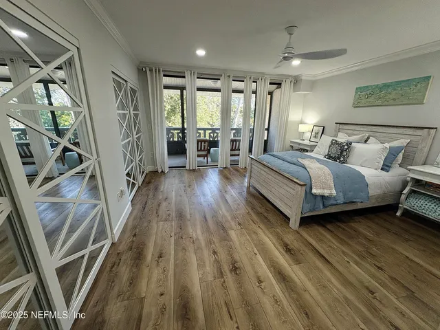 a view of a patio with table and chairs