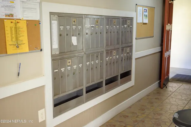 a view of a park with large trees
