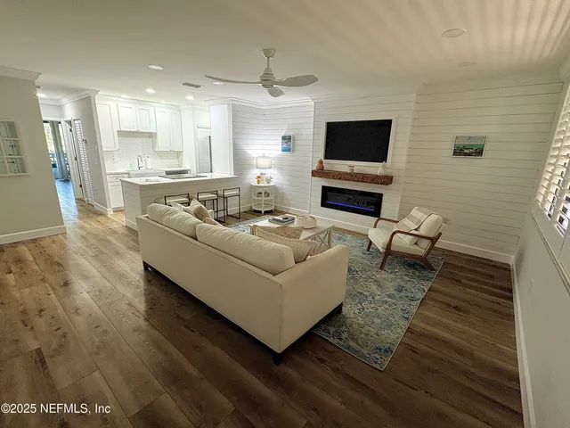 a kitchen with a sink cabinets and window