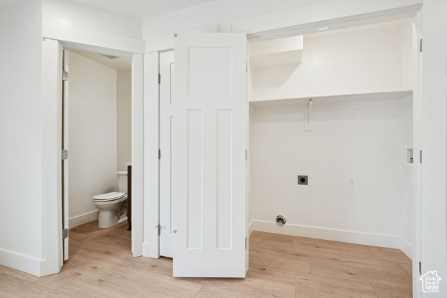 1615 North Angel Street, Unit H Layton, UT 84041 - Photo 17 of 55 Laundry area featuring light wood finished floors, hookup for an electric dryer, and hookup for a washing machine