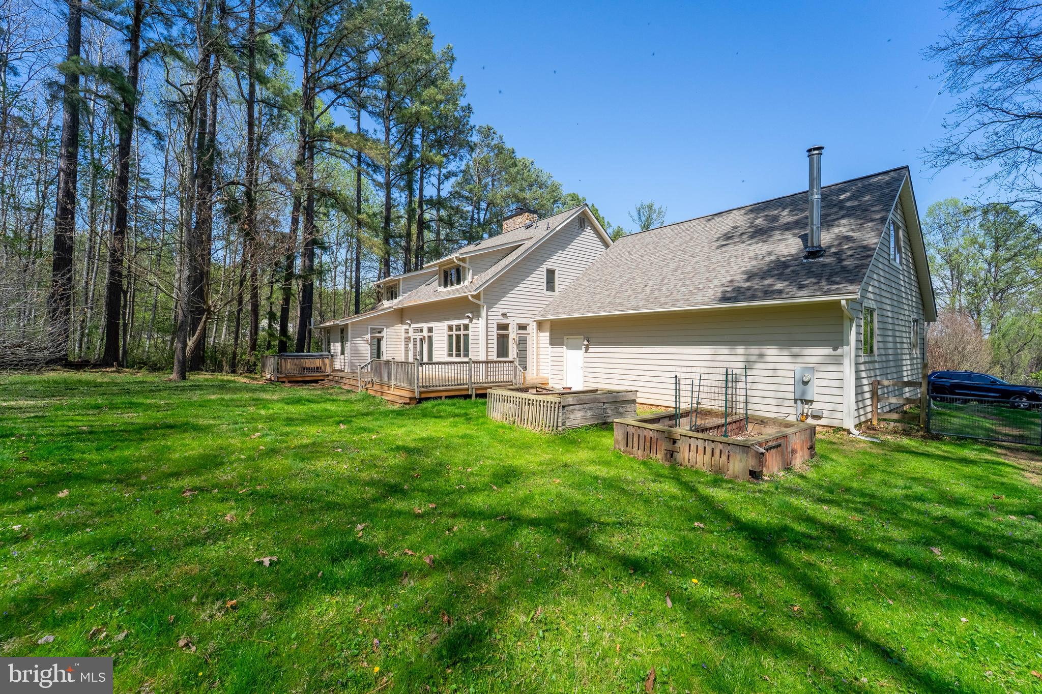 16746 Whites Store Road Boyds, MD 20841 - Photo 54 of 75 a view of a house with a yard porch and sitting area