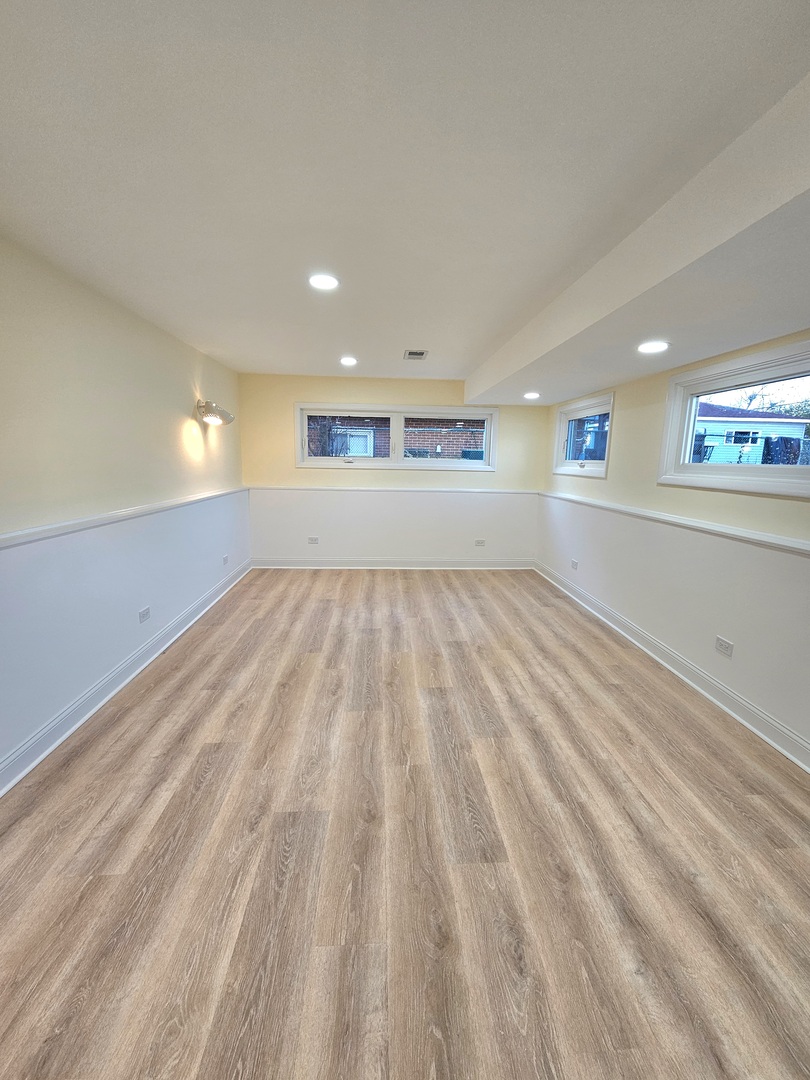 7434 Emerson Street Morton Grove, IL 60053 - Photo 24 of 38 a view of an empty room and window