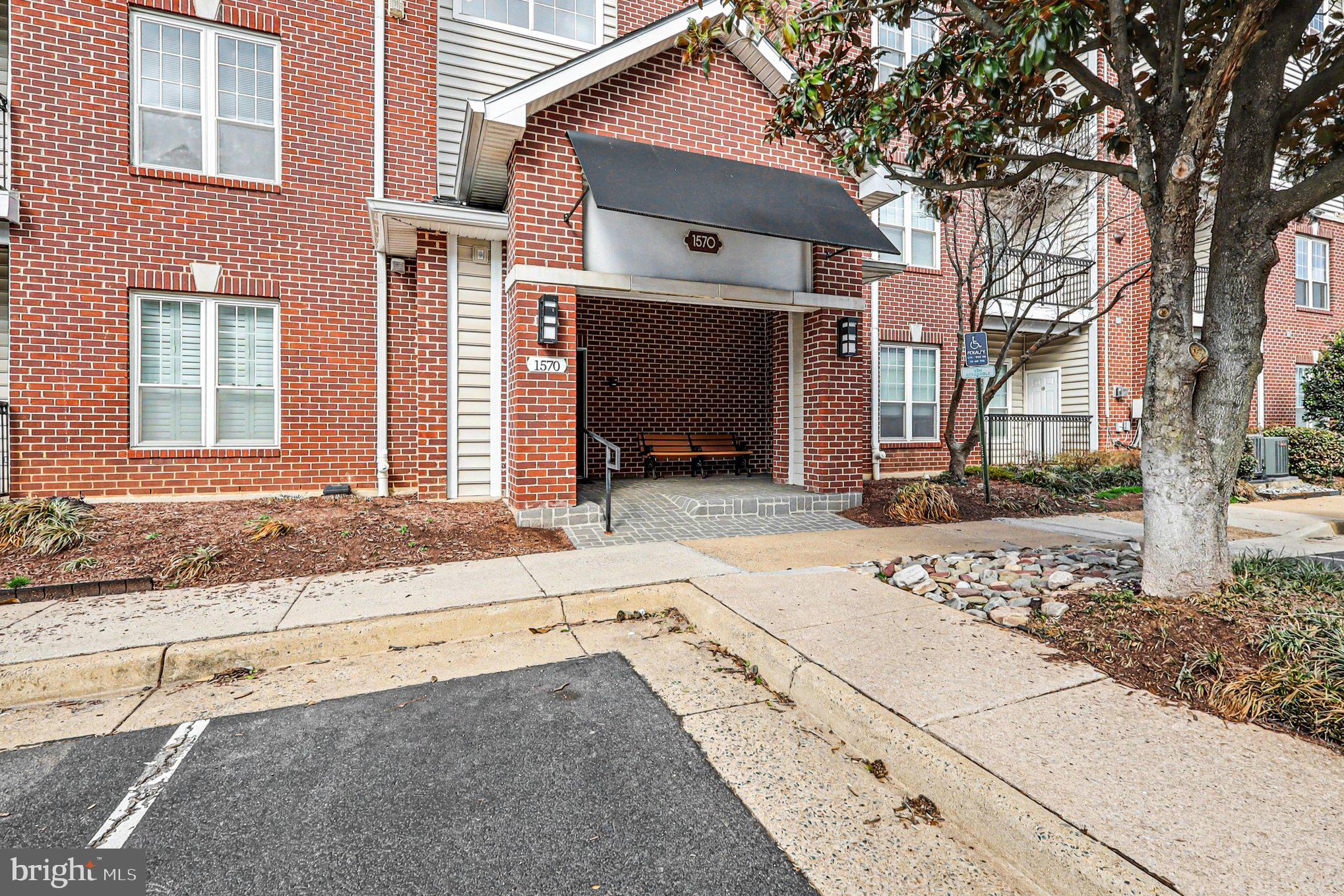 1570 Spring Gate Dr., Unit 7201 McLean, VA 22102 - Photo 2 of 20 Building entrance exterior