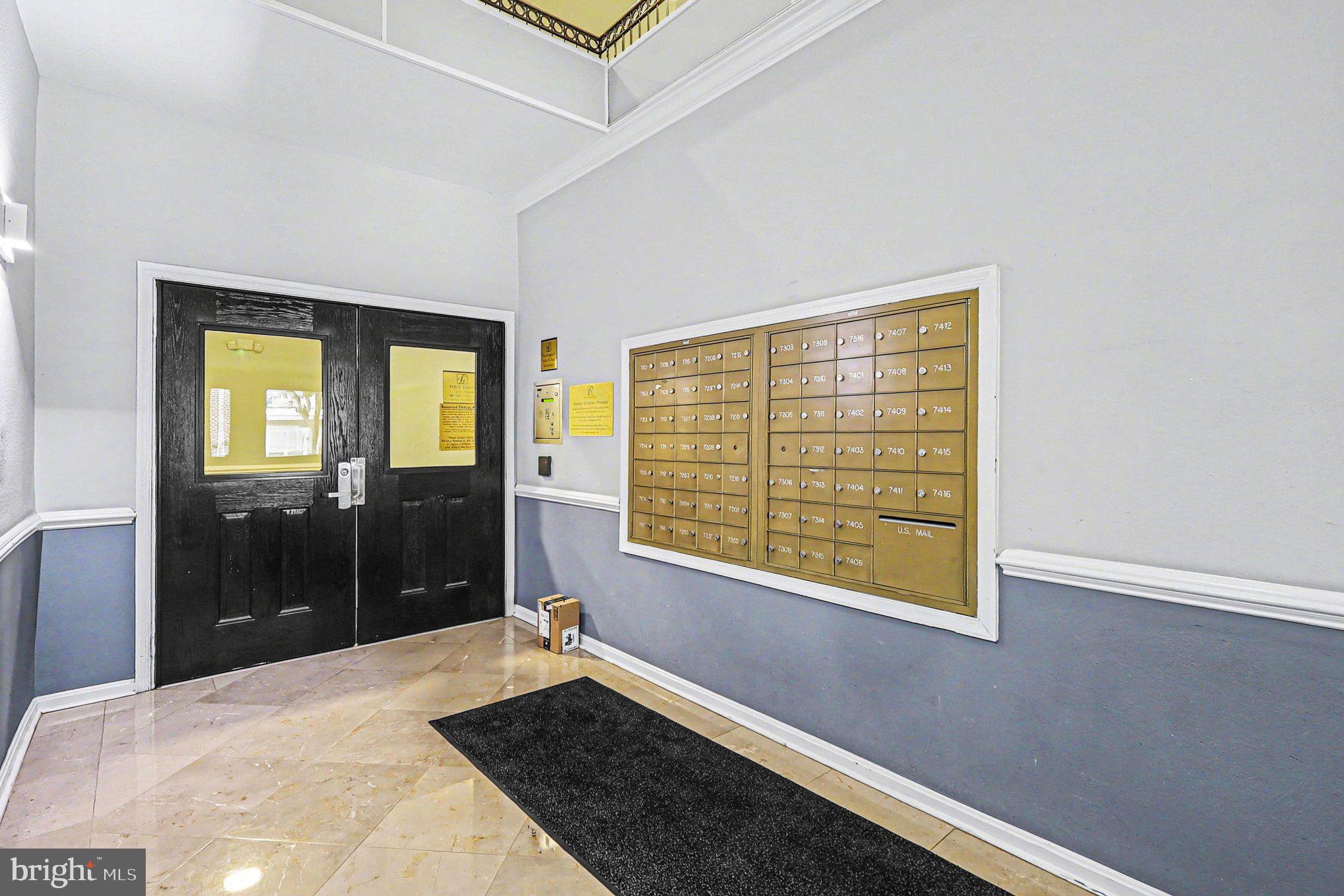 1570 Spring Gate Dr., Unit 7201 McLean, VA 22102 - Photo 4 of 20 Building entrance inerior