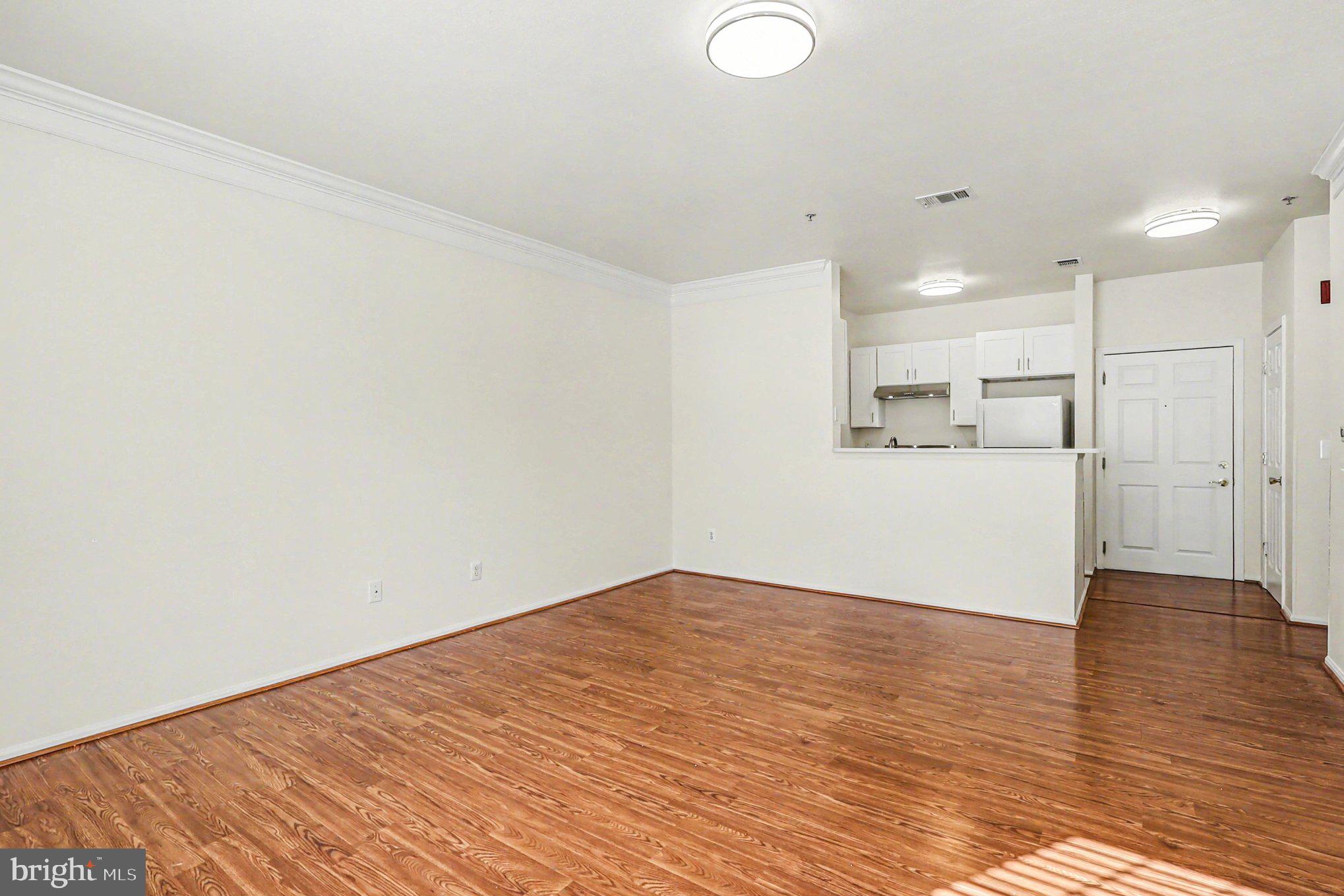 1570 Spring Gate Dr., Unit 7201 McLean, VA 22102 - Photo 10 of 20 Newly painted living room