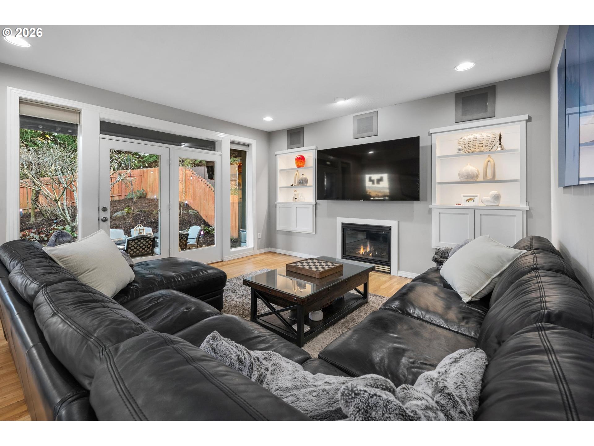13072 Southwest Morningstar Drive Portland, OR 97223 - Photo 17 of 48 a living room with furniture a flat screen tv and a fireplace