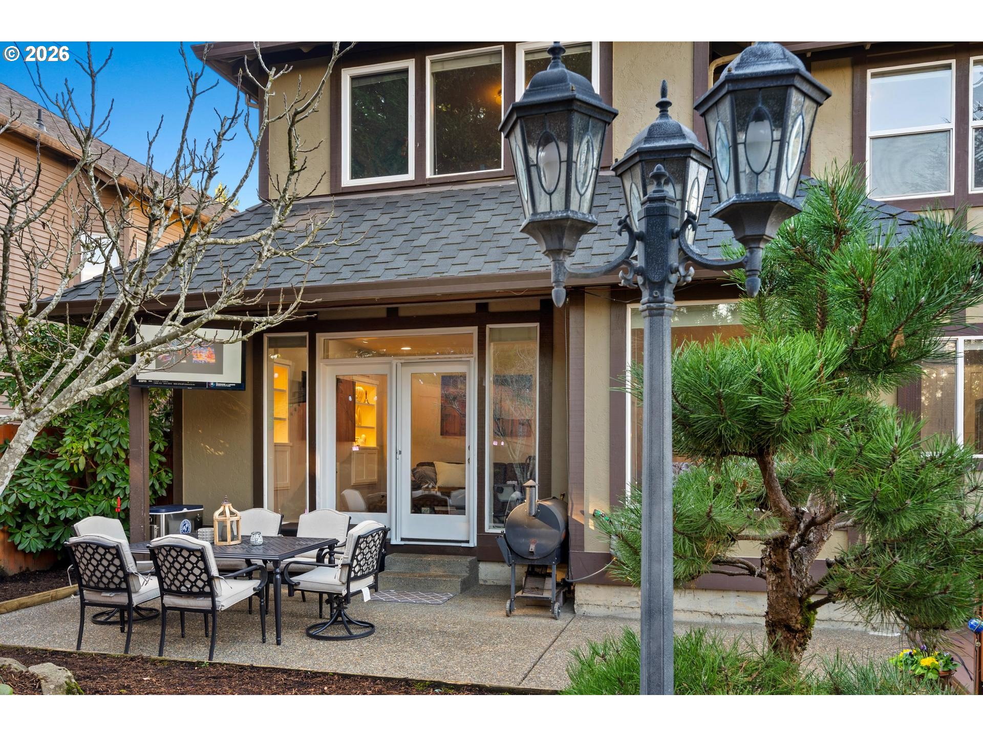 13072 Southwest Morningstar Drive Portland, OR 97223 - Photo 37 of 48 a view of a house with backyard porch and sitting area