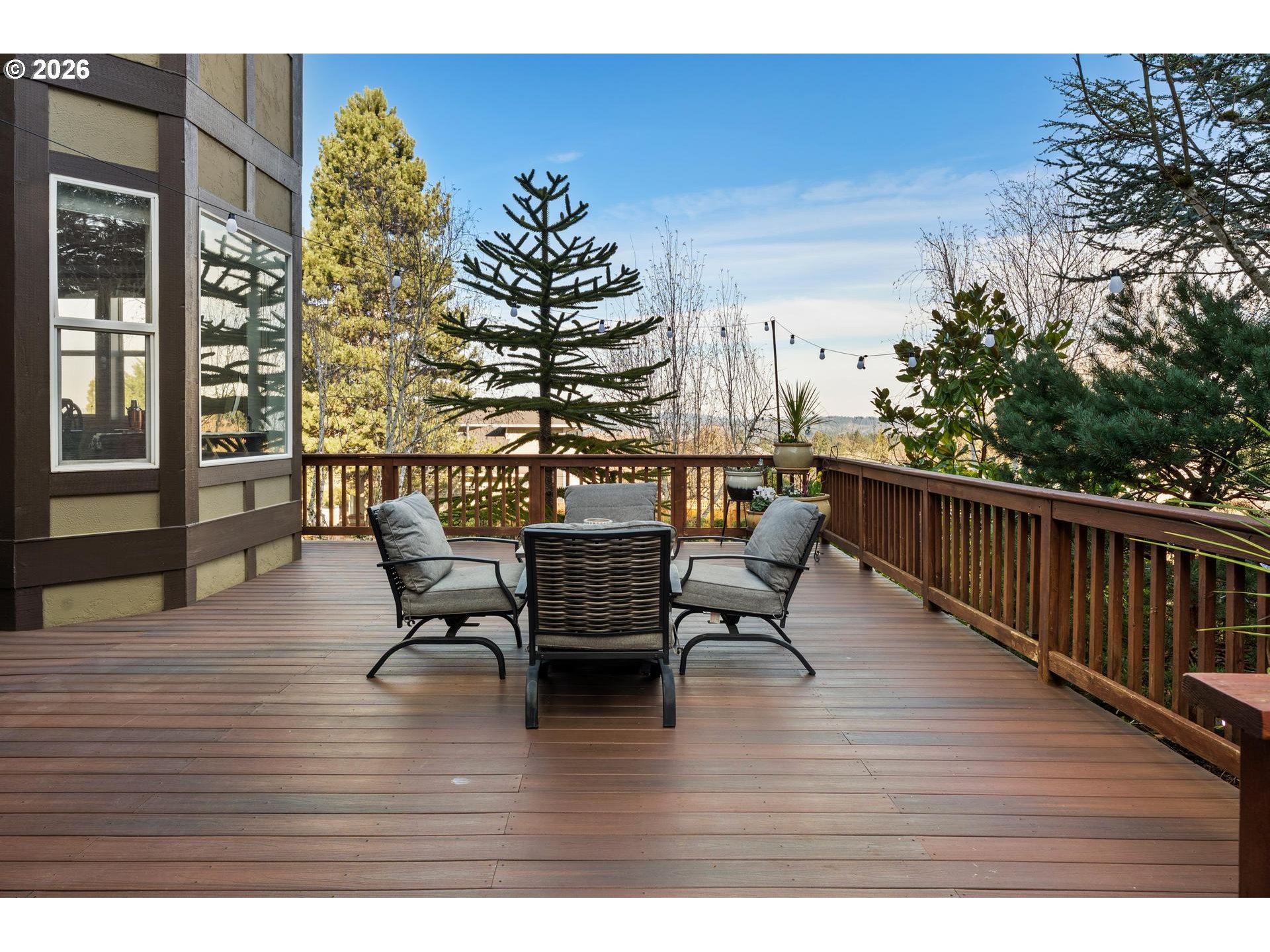 13072 Southwest Morningstar Drive Portland, OR 97223 - Photo 40 of 48 a view of a chairs and table on the wooden floor