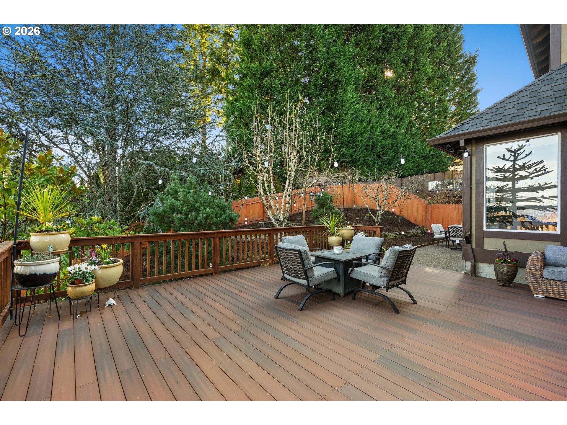 13072 Southwest Morningstar Drive Portland, OR 97223 - Photo 41 of 48 a balcony with wooden floor table and chairs