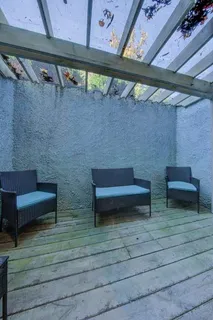 a view of outdoor seating area with furniture