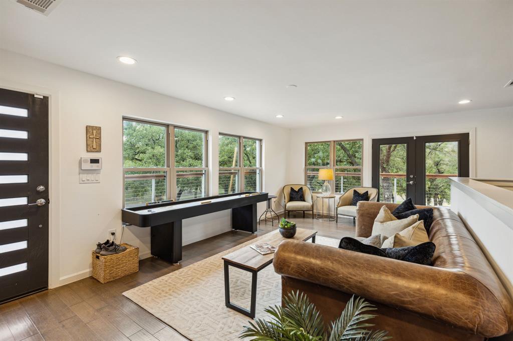 7342 Briar Road Azle, TX 76020 - Photo 11 of 40 a living room with furniture and large windows