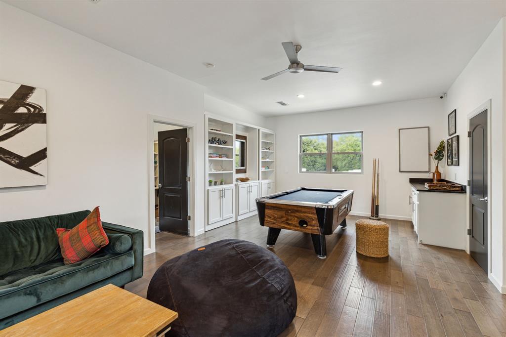 7342 Briar Road Azle, TX 76020 - Photo 13 of 40 a living room with furniture and a wooden floor